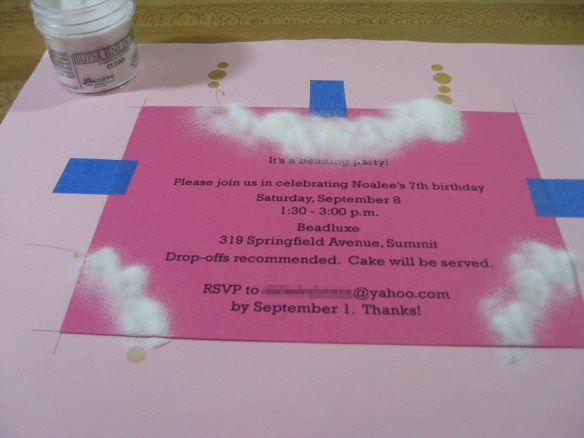 photo of invitation covered with clear embossing powder