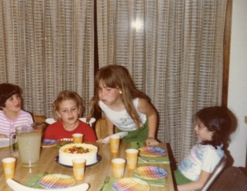 Four girls at a birthday party in 1979.